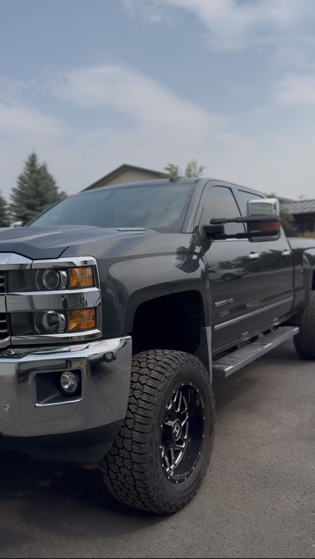 Charcoal Chevy Silverado 2500HD with ceramic window tint installed by Nfamous Customs in Central Oregon